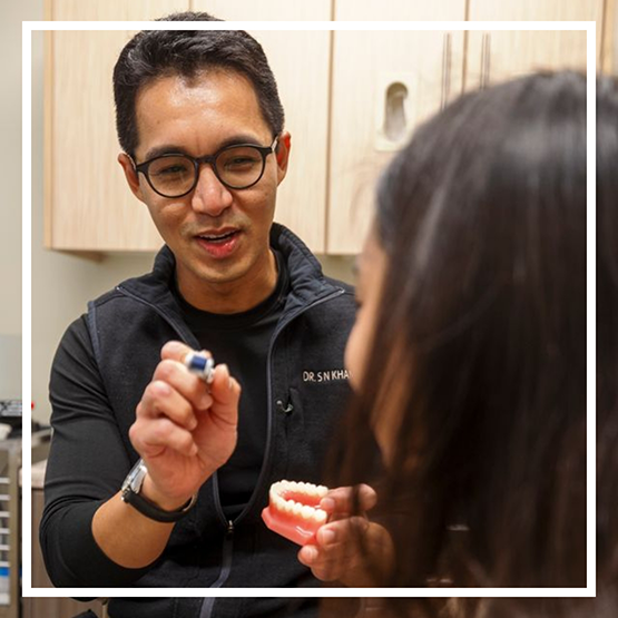 Doctor Kham talking with a patient