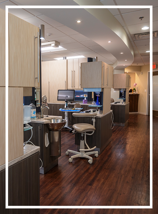 Family of three smiling at home