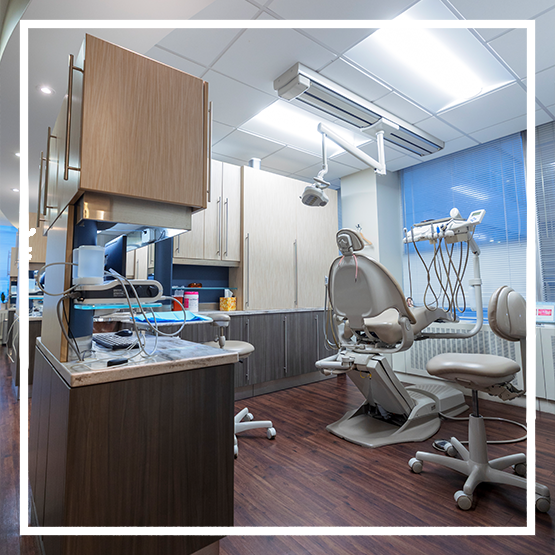 Woman in the dental chair talking with her dentist