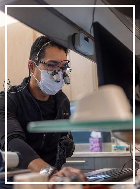 Doctor Kham treating a dental patient in Washington, DC