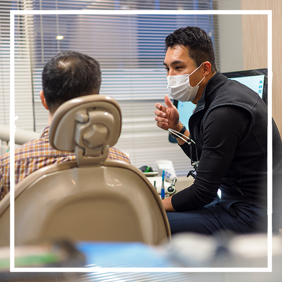 Woman getting an injection near her jaw joint